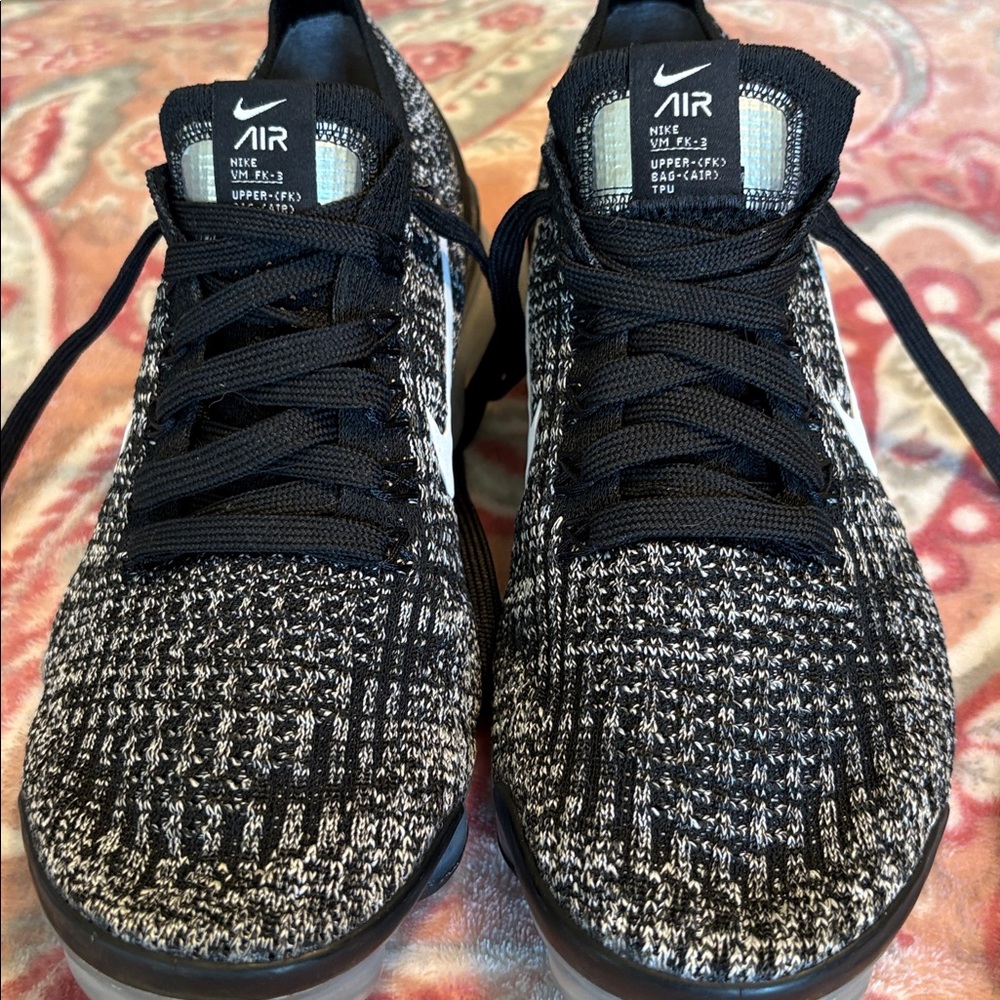 Nike Black and White Flyknit Air Women’s Running Sneakers